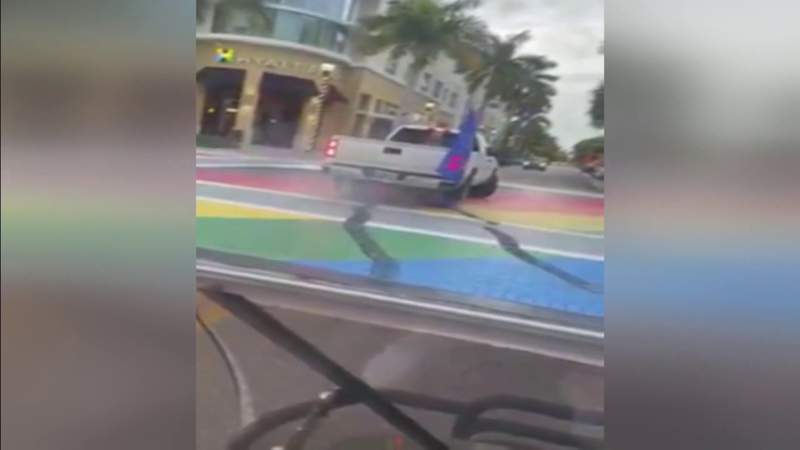 Man surrenders after video shows vandal in truck with Trump flag damaging Pride mural
