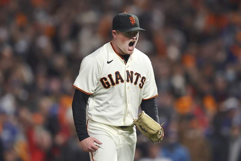 Masterful Webb pitches Giants past Dodgers in playoff opener