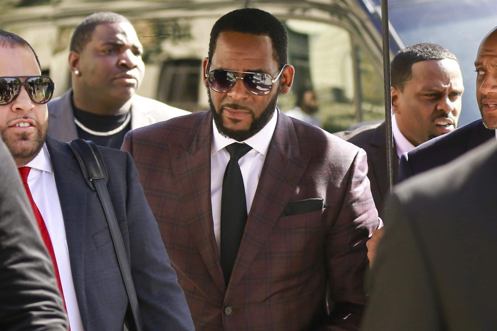 R. Kelly's manager charged with phone threats to theater