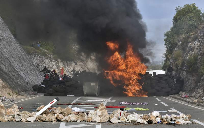 Police clash with opponents of Serbian church in Montenegro