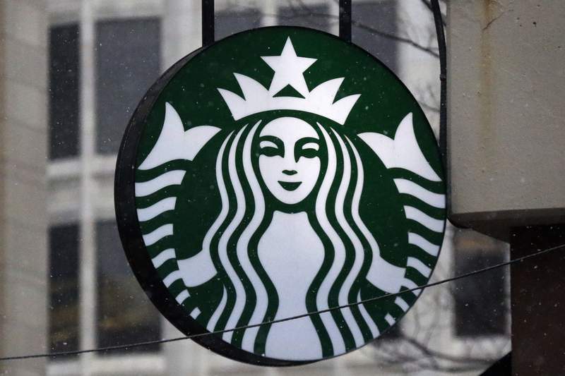 Starbucks hits sales record as customers return to stores