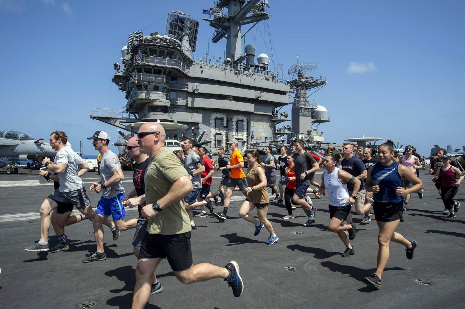 Dodging virus, Navy ships break record for staying at sea
