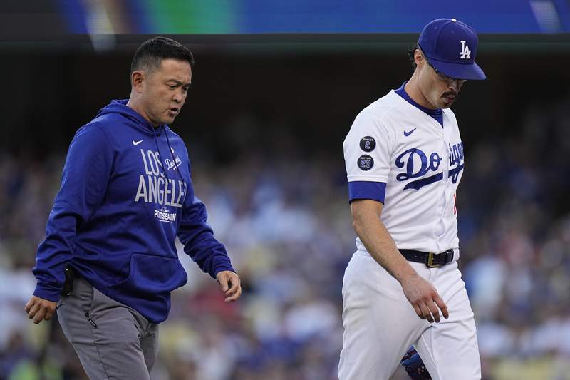 Dodgers opener Kelly gives up HR, injured in NLCS Game 5