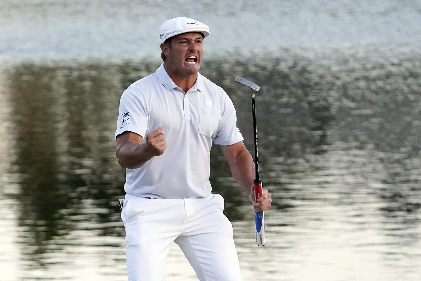 DeChambeau makes big putts to outlast Westwood at Bay Hill