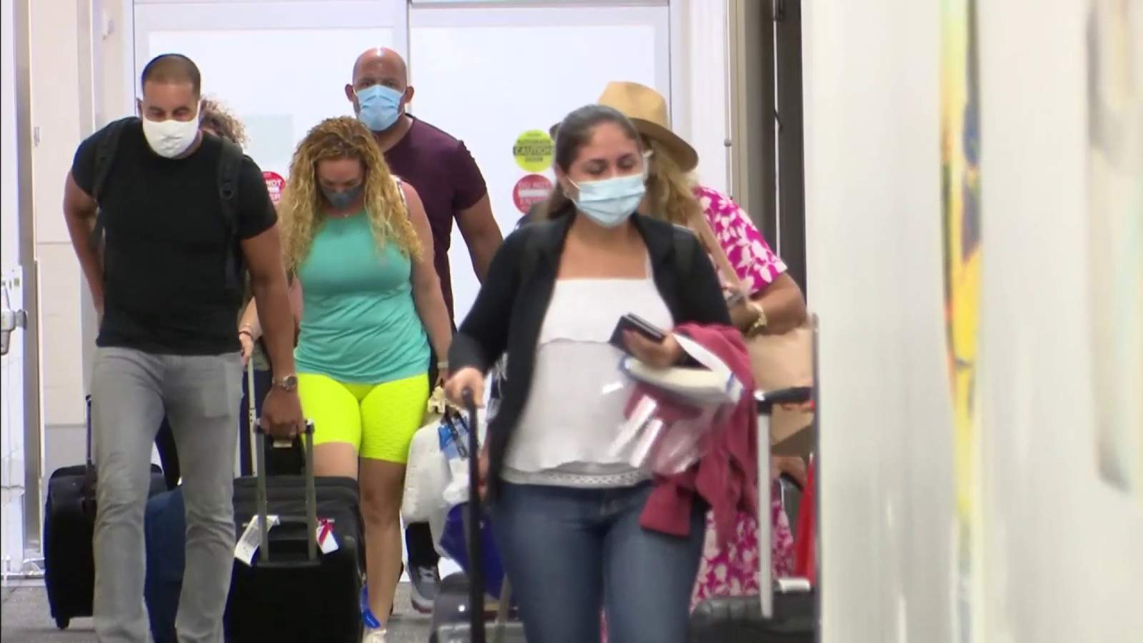 Travelers arrive in Fort Lauderdale after fleeing Cancun ahead of Hurricane Delta