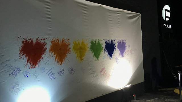 Gates surrounding Pulse nightclub open to public for mural unveiling