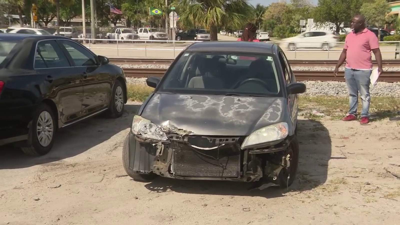 Car clipped by Brightline train after driver stops on tracks in Pompano Beach