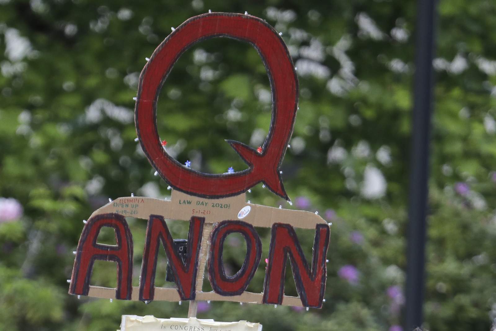 QAnon supporters behind canceled fundraiser give Trump $1M