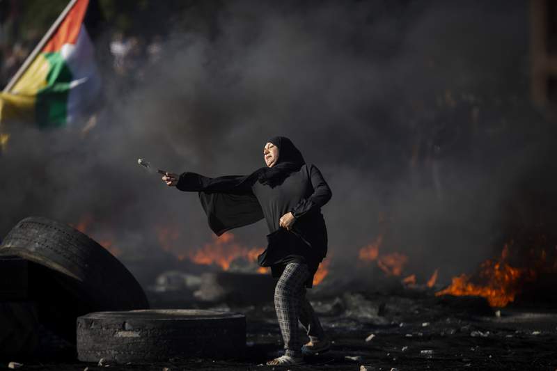 Palestinians go on strike as Israel-Hamas fighting rages
