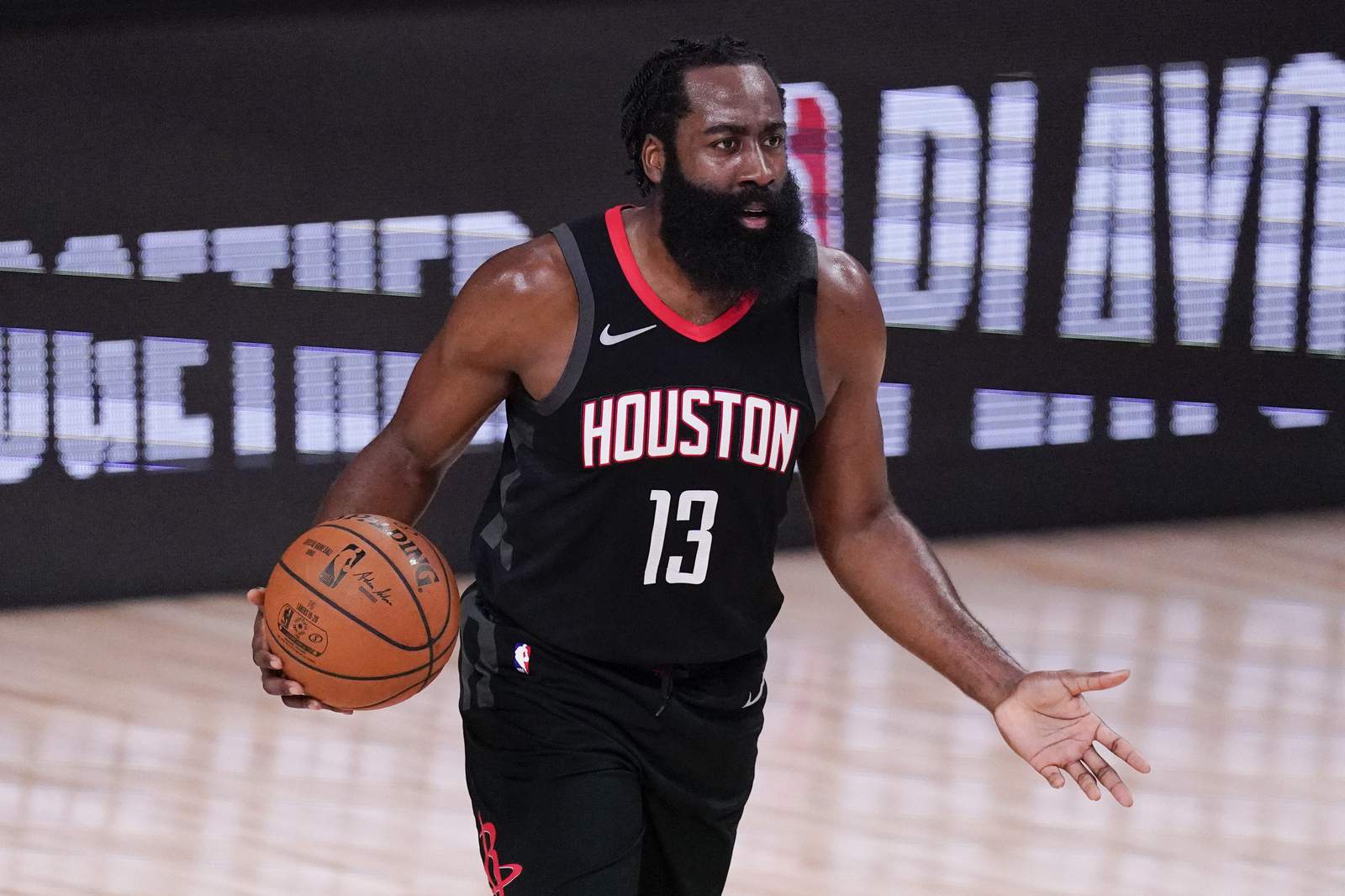 Harden in Houston for COVID tests after missing camp's start