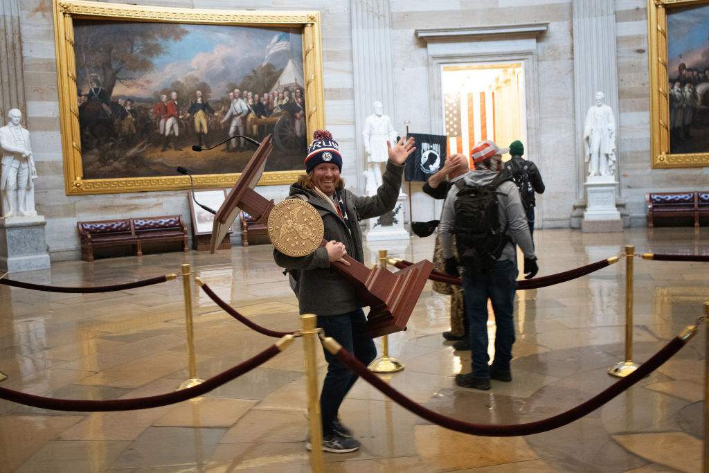 Florida man seen carrying lectern in siege on U.S. Capitol arrested Friday night
