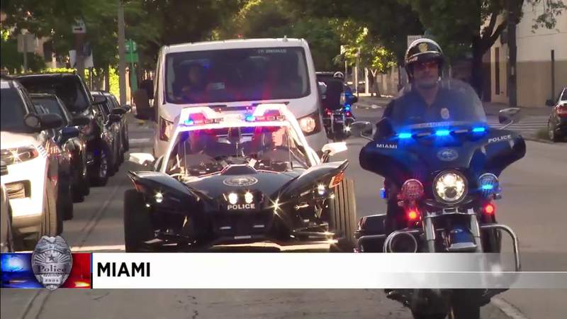 Miami police take grieving 5-year-old survivor on day-long adventure