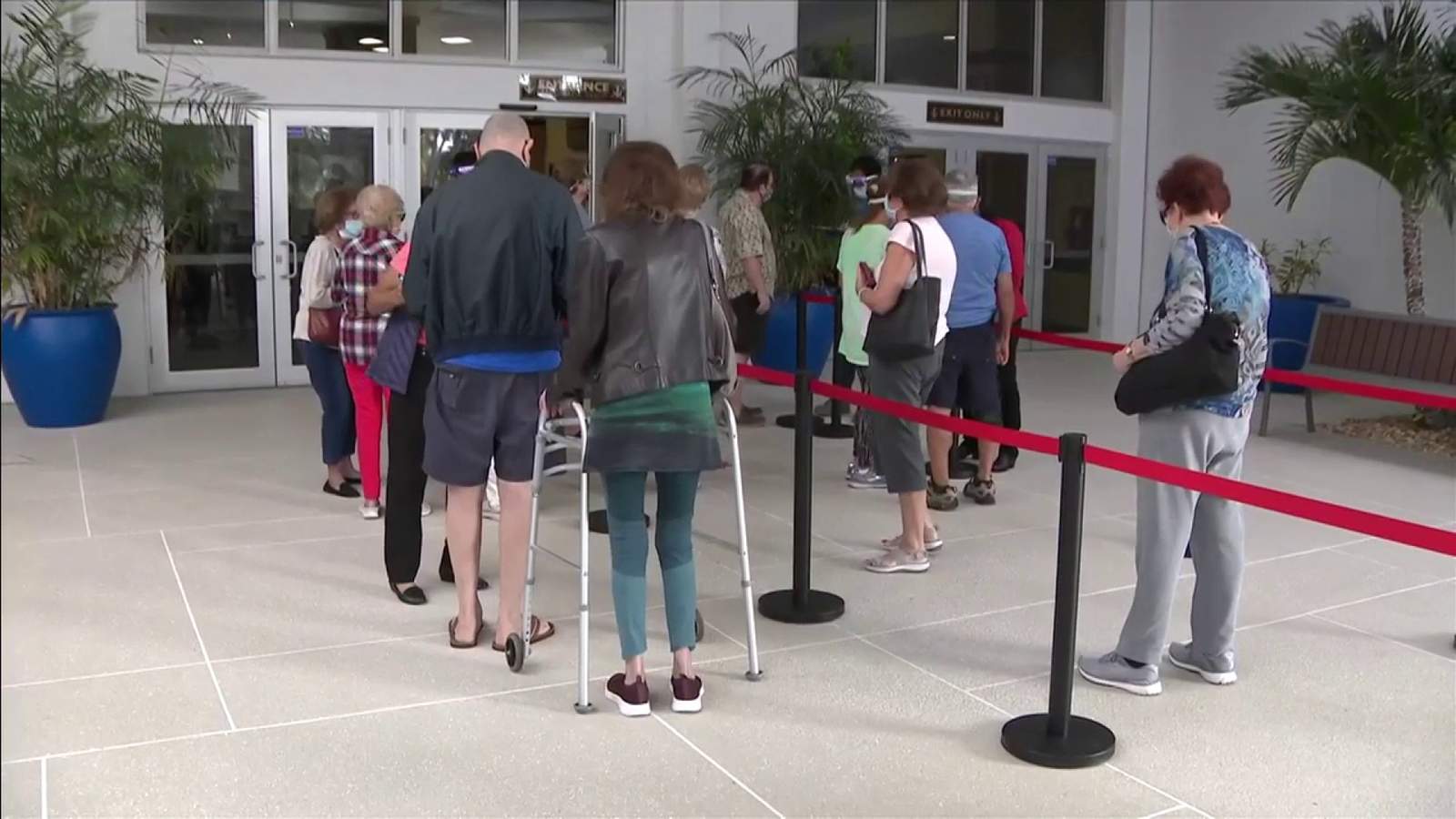 Seniors wait in long lines just to sign up for vaccine appointments