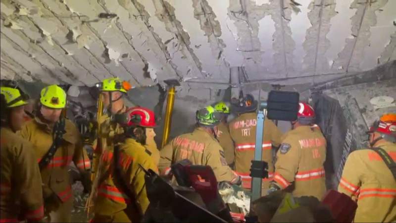 Engineers help search-and-rescue teams tunnel through debris of collapsed building in Surfside