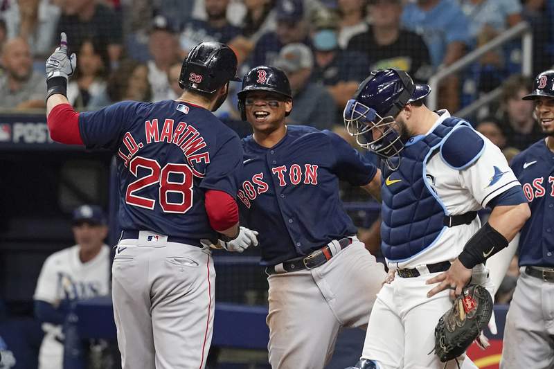 Red Sox flex muscles, power past Rays 14-6 to even ALDS 1-1