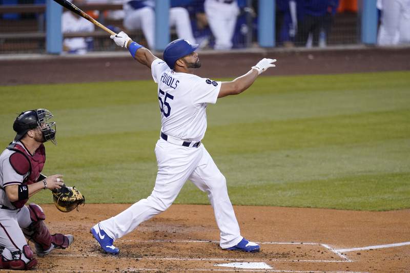 Dodgers get HRs from Smith, Pujols in 3-2 win over D-backs