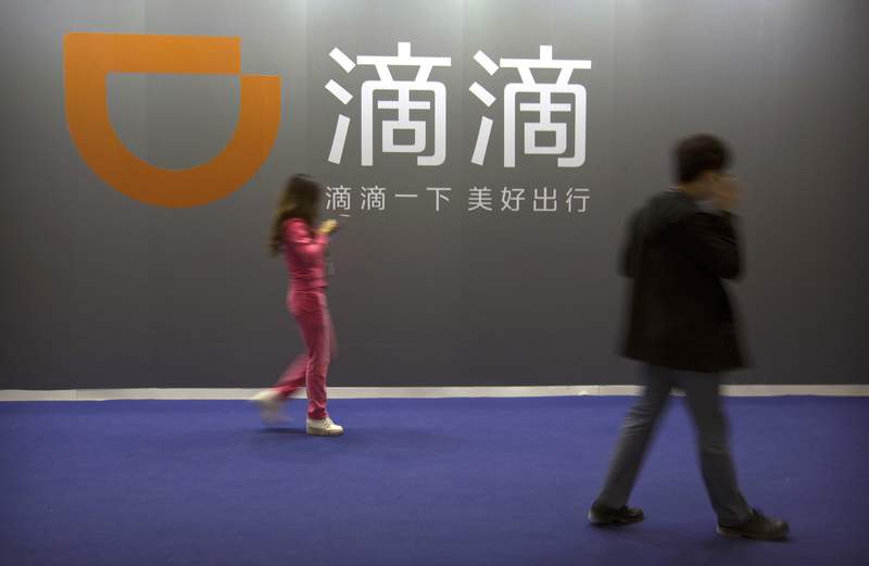 China's Didi ride-hailing service jumps in Wall Street debut