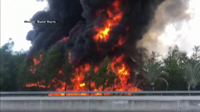 1 dead after tanker crashes, spilling fuel and causing large fire