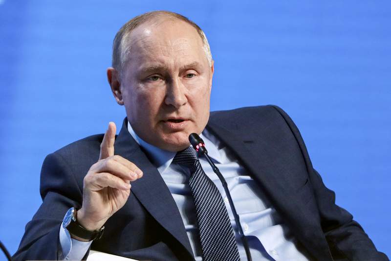 Putin says relations with Biden "working and stable"