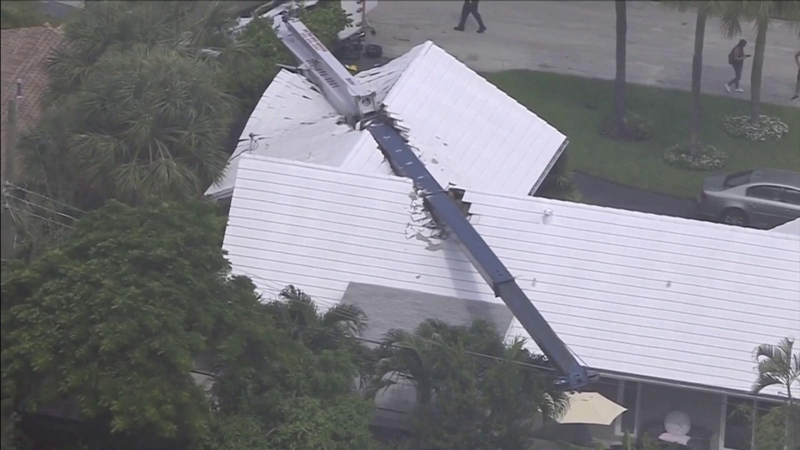 Cleanup efforts ongoing after crane falls on home in Fort Lauderdale