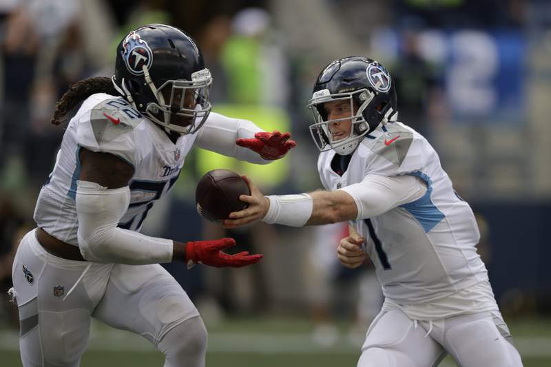 King Henry leads Titans' late rally to stun Seahawks 33-30