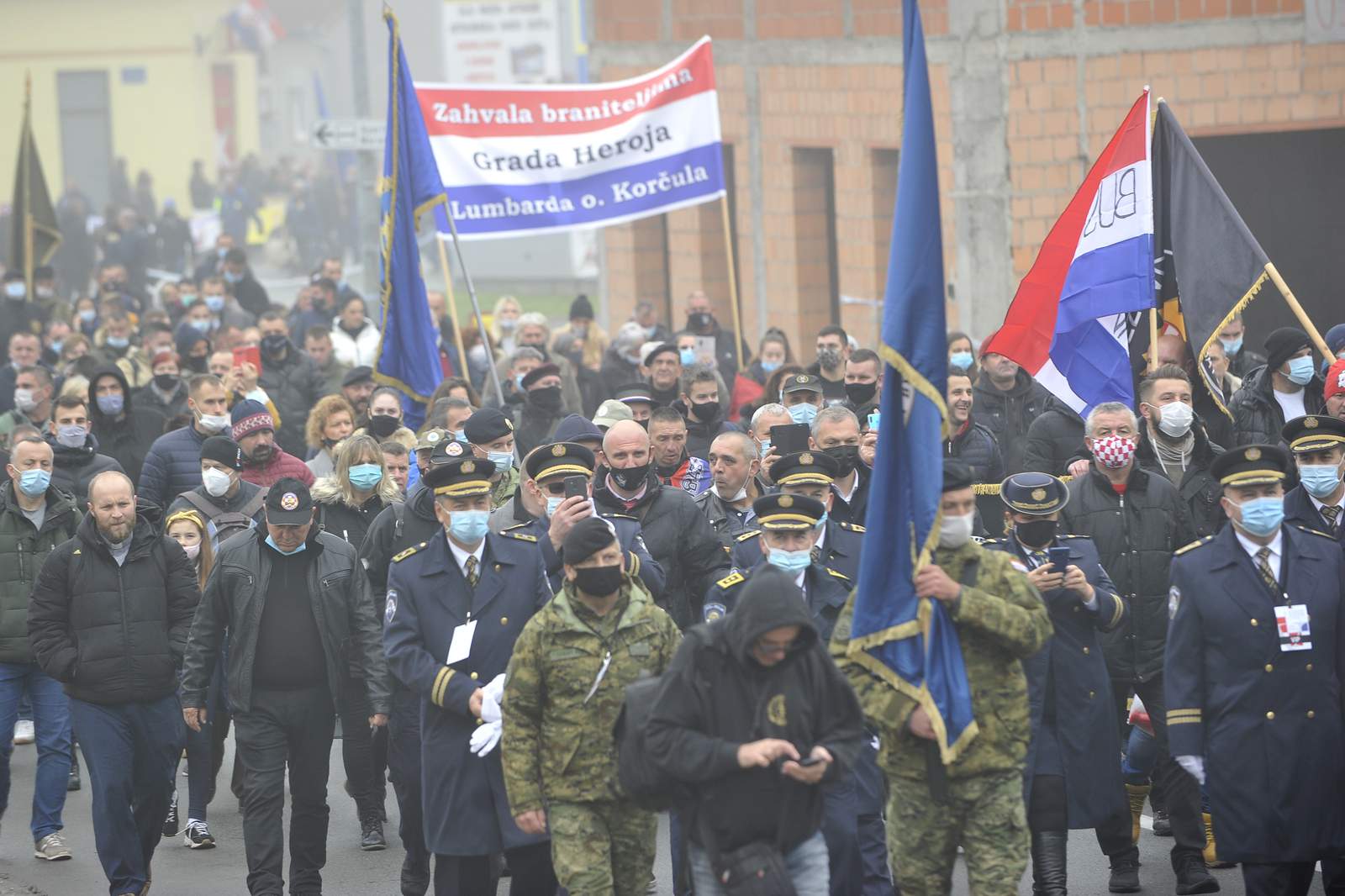 Thousands march in Croatia to honor war city despite virus