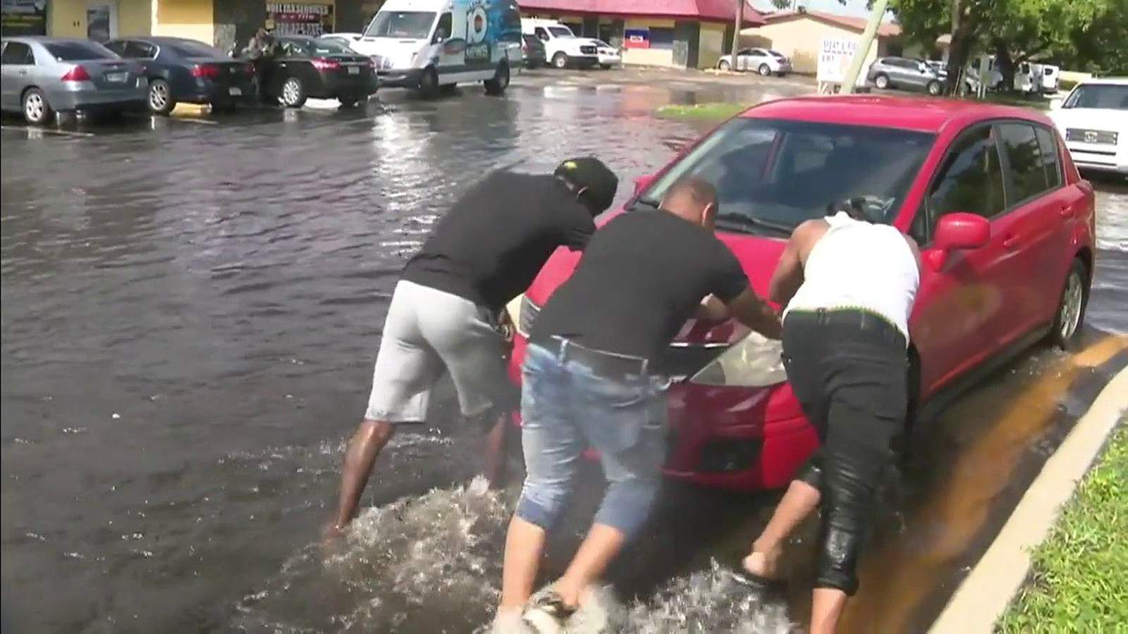 Stranded cars, sidewalk hot plates, and plenty of water in Lauderhill
