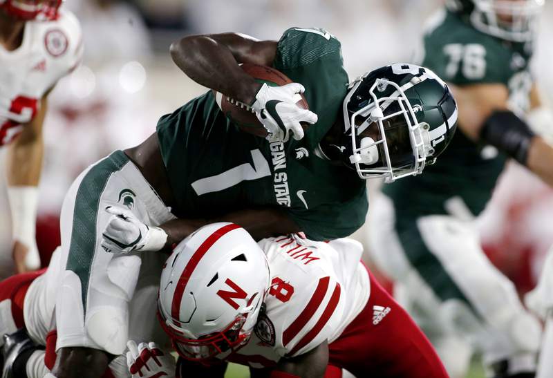 OT interception lifts No. 20 Spartans over Nebraska 23-20