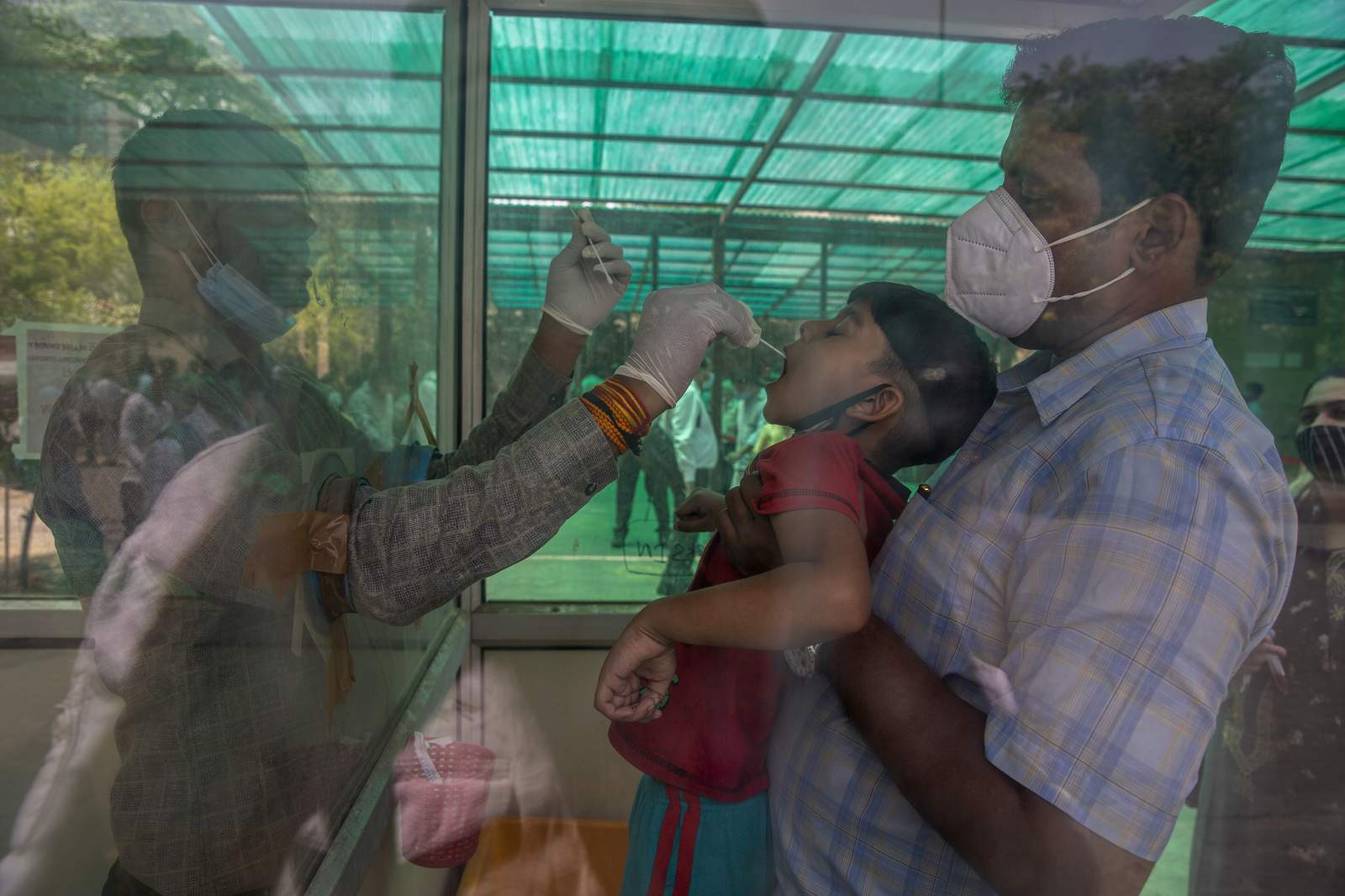 India's biggest cities shut down as new virus cases hit 200K