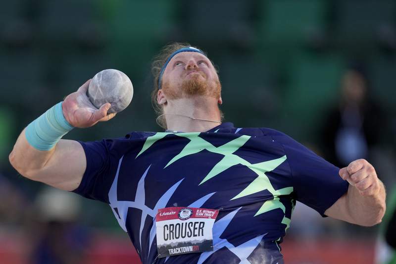The Latest: Crouser breaks 31-year-old shot put WR