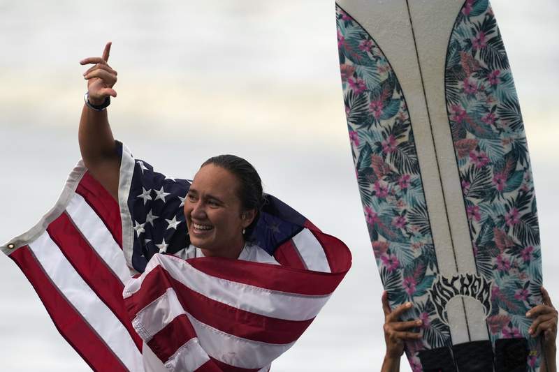 Native Hawaiians 'reclaim' surfing with Moore's Olympic gold