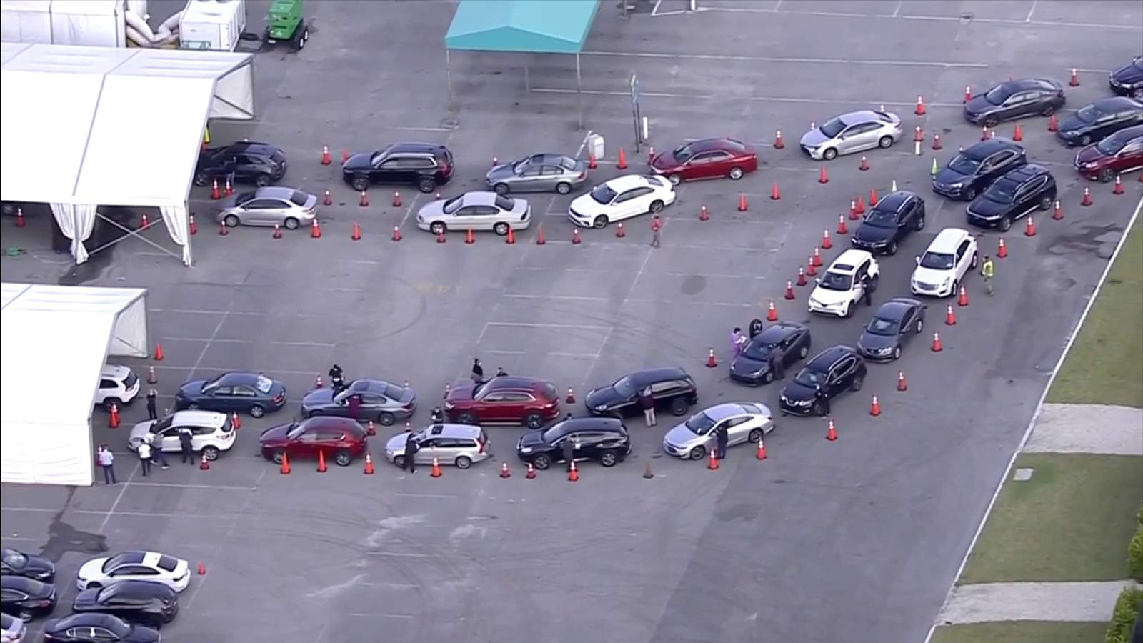 Long lines greet seniors with appointments to Florida’s first drive-thru vaccination location