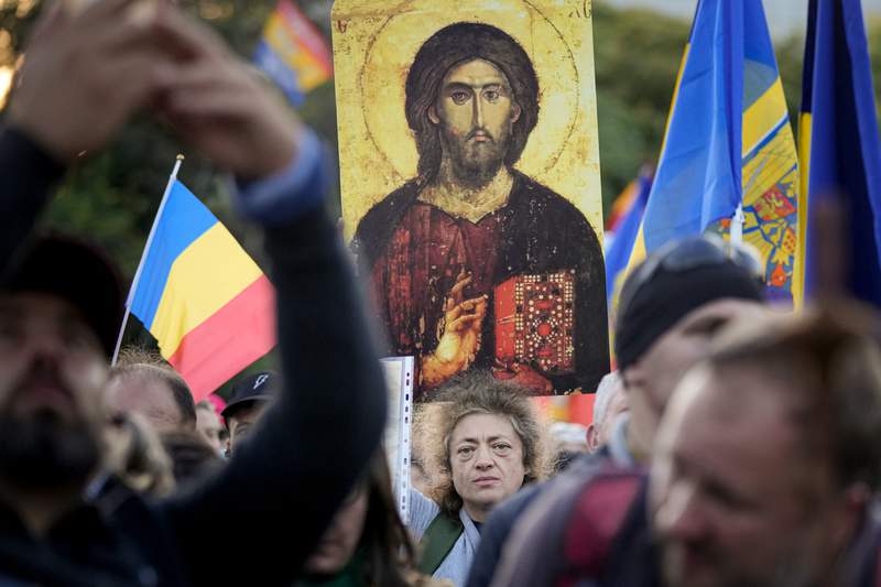 Far-right protesters in Romania reject virus restrictions