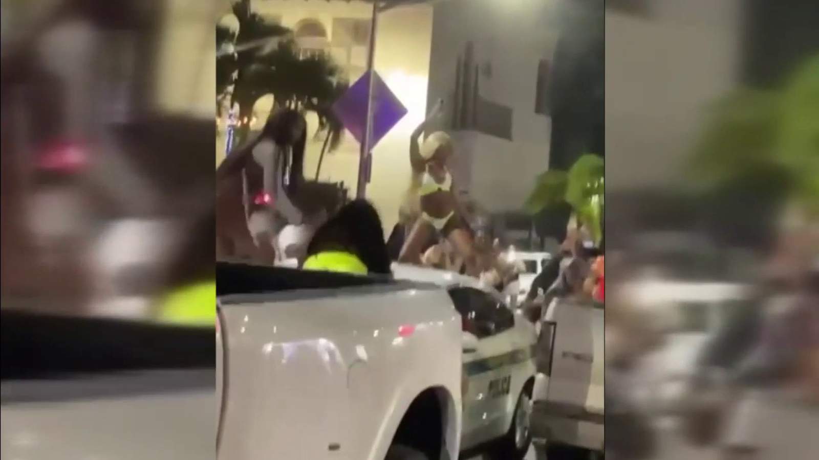Noche salvaje en Miami Beach: mujeres perrean en patrulla de policía, dos oficiales heridos