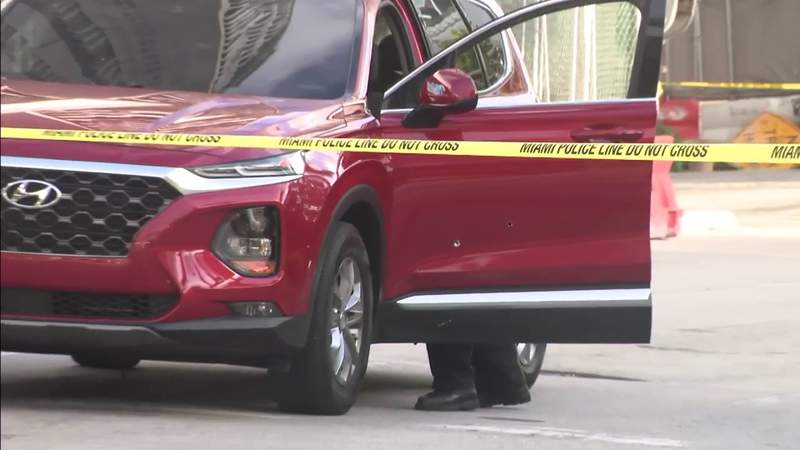 Vehicle driving in Downtown Miami struck by multiple bullets