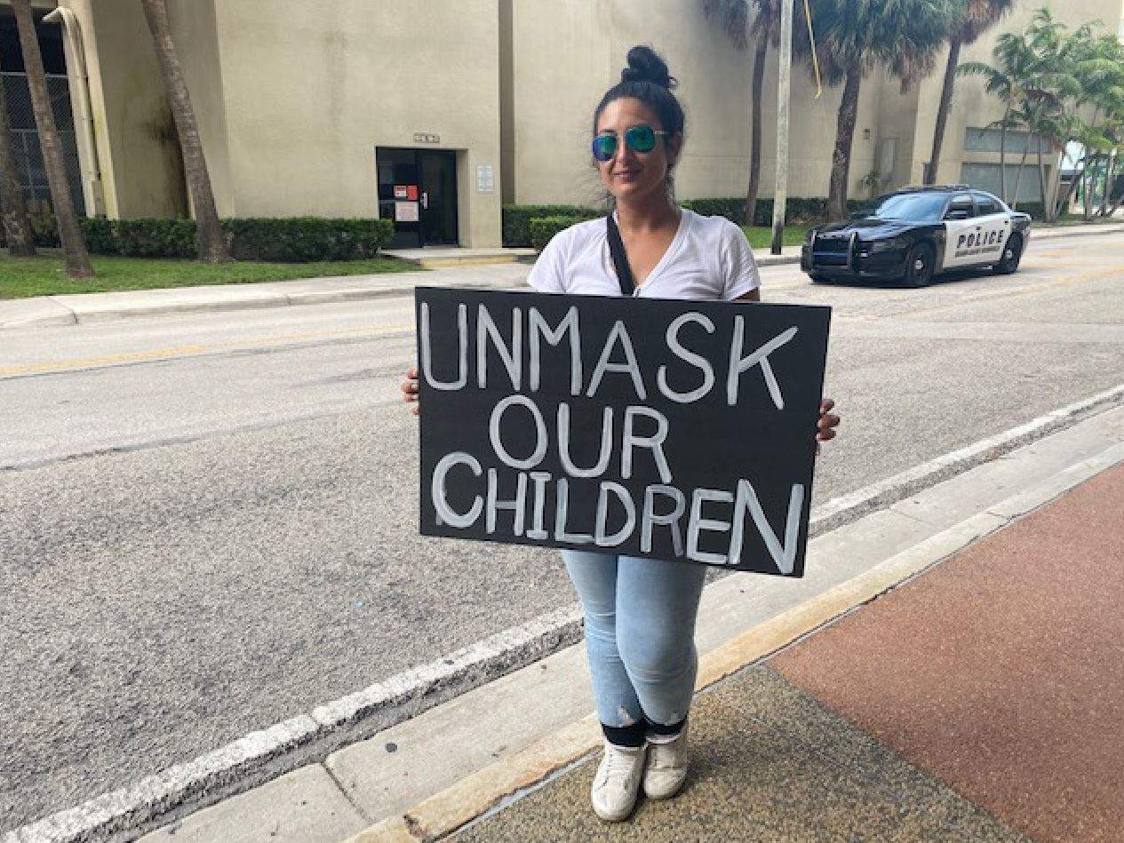 Gelpi De Luz, 31, does not have kids but said she was outside the Miami-Dade School Board Administration Building Wednesday afternoon while a school board meeting was underway to demonstrate against mask mandates.