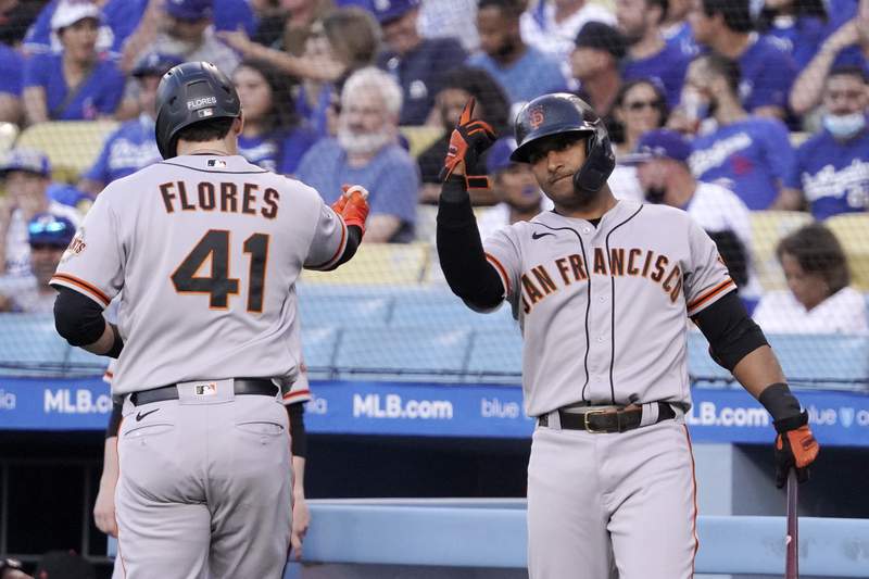 Posey comes through in return as Giants defeat Dodgers 7-2