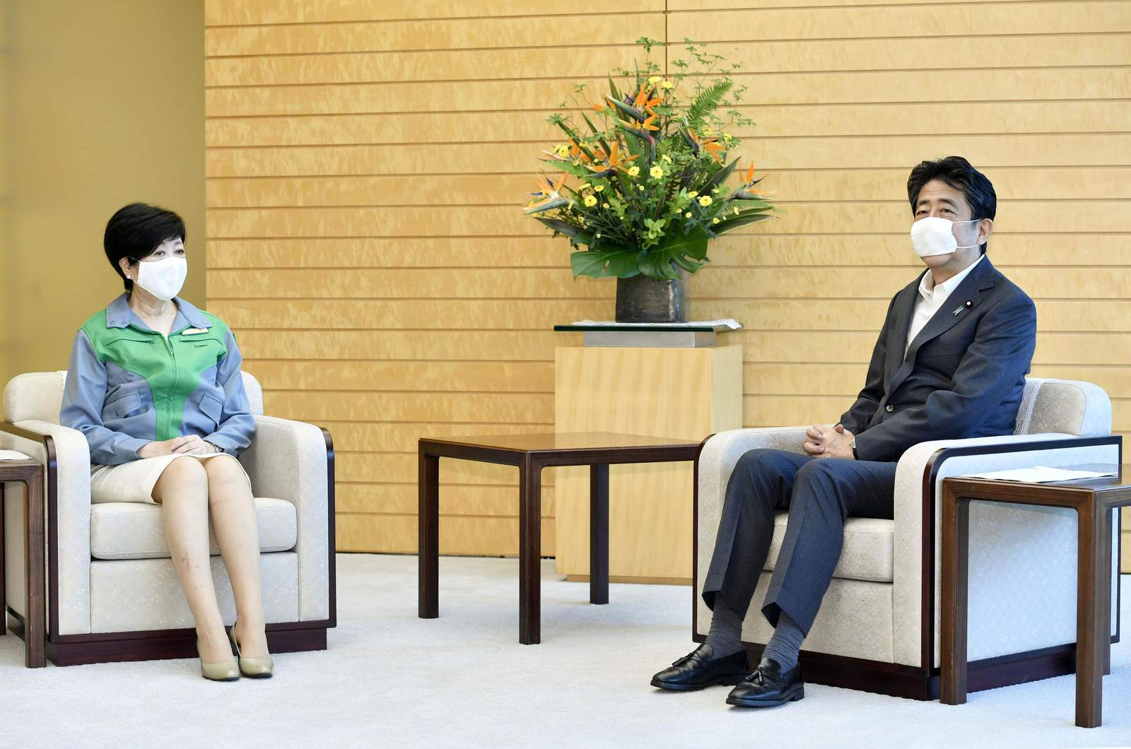 Tokyo governor, Abe say they'll cooperate on virus, Olympics