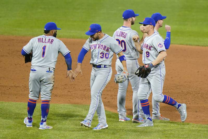 Alonso, Mets top Phillies 8-7 after replay reversal