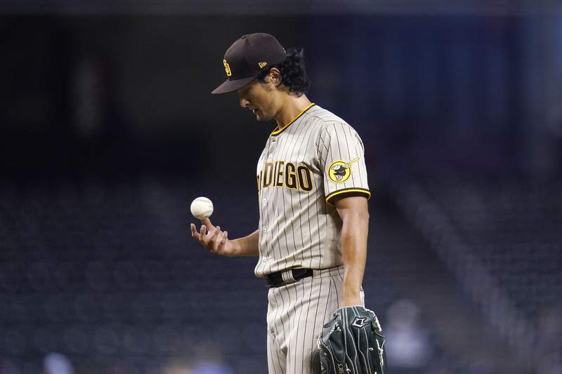 Darvish (back) exits early, Diamondbacks beat Padres 12-3