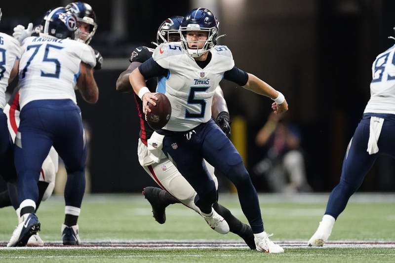 Woodside, Barkley throw TDs as Titans stop Falcons 23-3