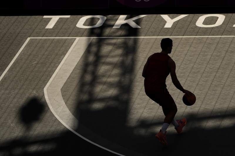 The Latest: USA Basketball awaits final three NBA players