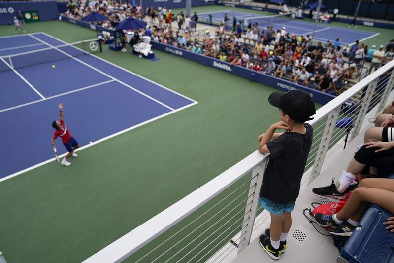 Even as COVID cases rise, US Open, other events welcome fans