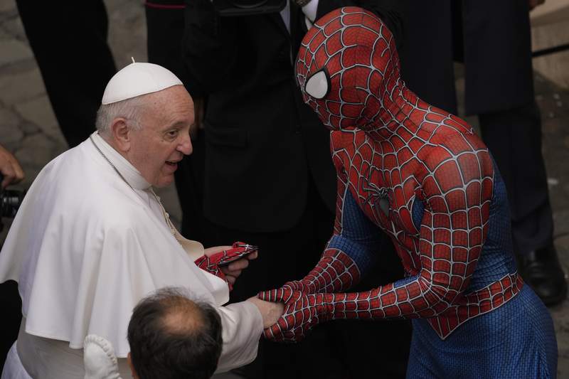 'Super-hero' in Spider-Man outfit meets pope at Vatican