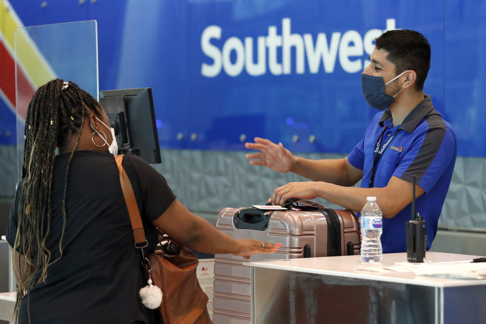 As virus cases rise, Southwest sees slower travel recovery