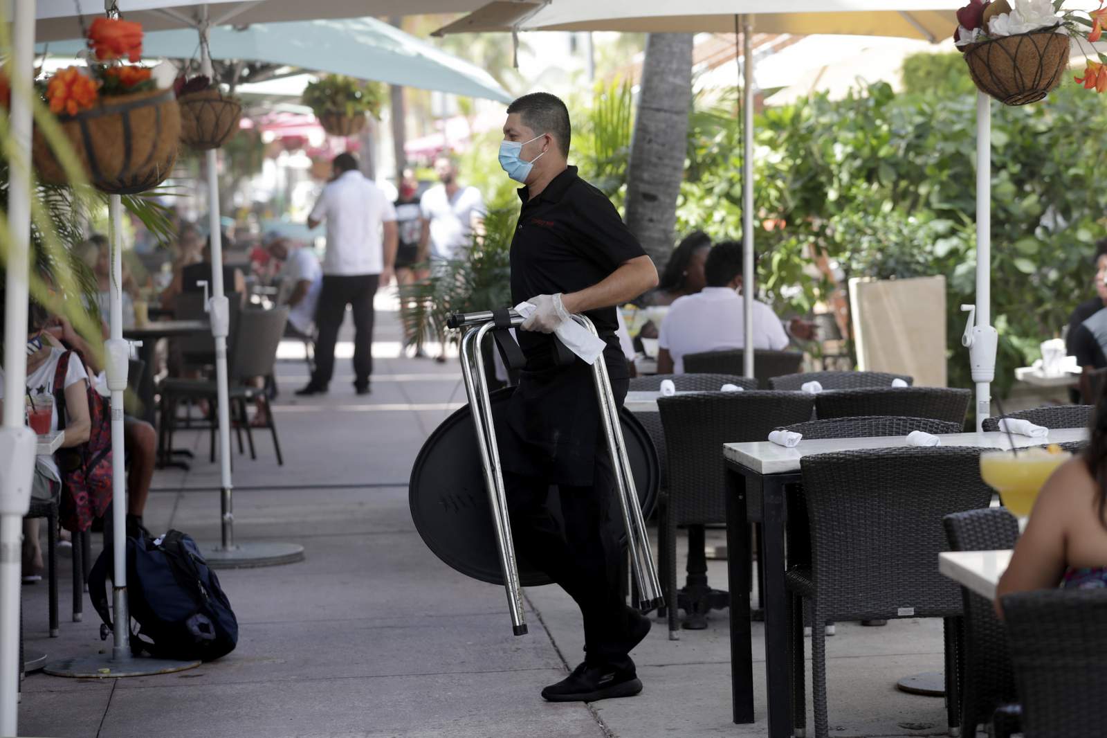 In Miami, outdoor facilities, including restaurants, will reopen Sunday