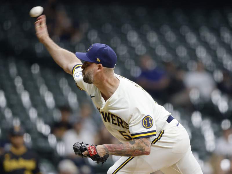 Brews' Axford out for year after 1 game; Lauer on COVID list