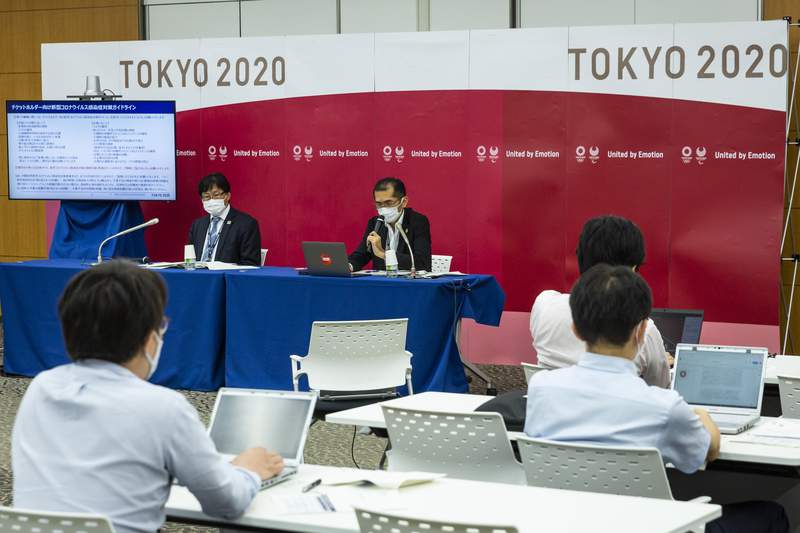 Holding Tokyo Olympics in pandemic shreds consensus in Japan