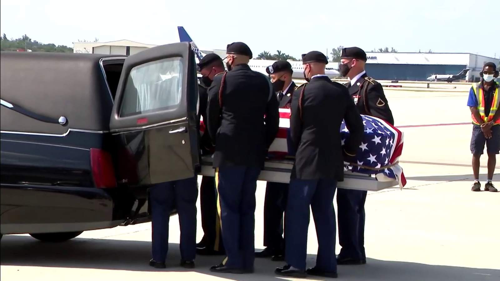 Slain Army Sgt. 1st Class John Jean’s closed casket arrives at Fort Lauderdale airport