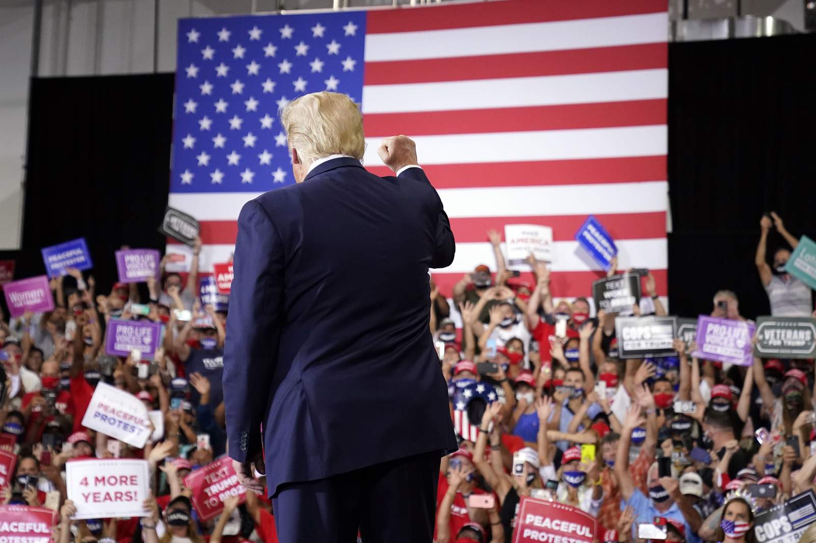 In defiance of Nevada governor, Trump holds indoor rally